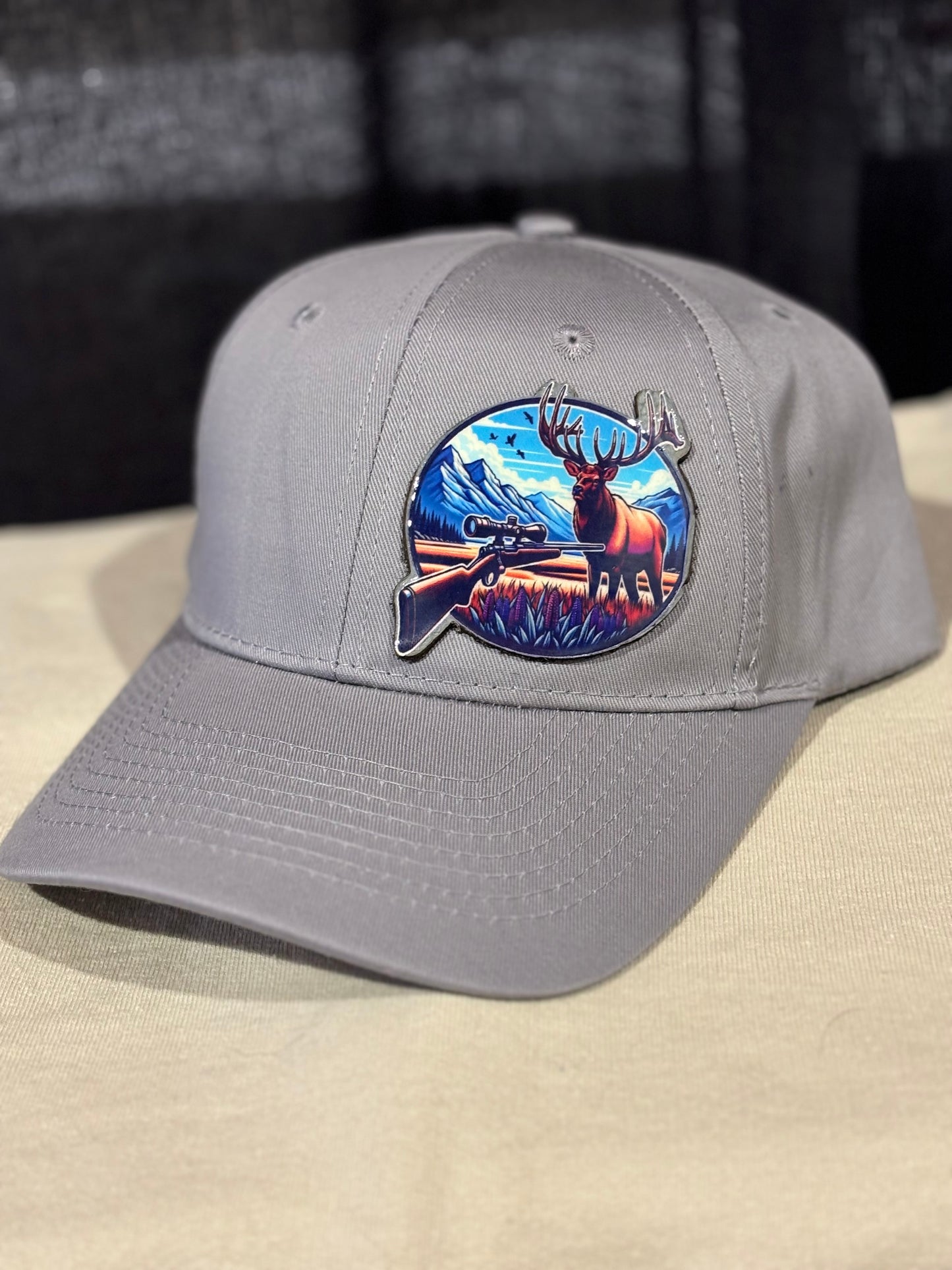 Rifle and Elk Hat